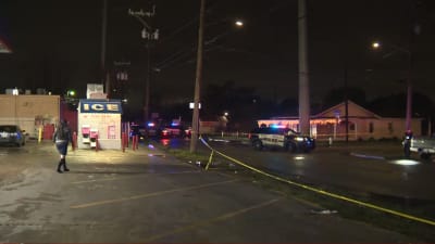 Two security guards hurt after man opens fire with a rifle outside strip  club