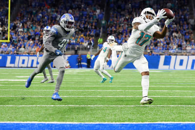 Miami Dolphins running back Lynn Bowden (15) runs after a catch against the  New England Patriot …