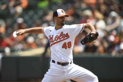 Baltimore Orioles' Brady Anderson (9) watches his two-run homer in