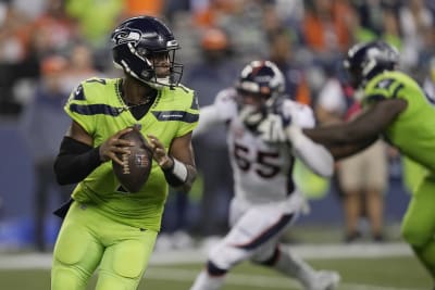 Seahawks survive Wilson's return, edge Broncos on missed FG