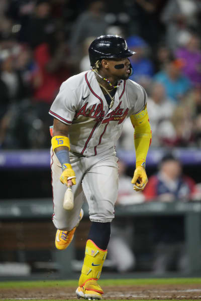 Ronald Acuña Jr. knocked over by fan charging field in Colorado