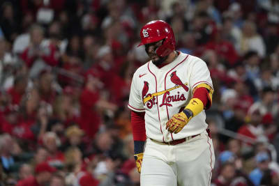 St. Louis Cardinals' Nolan Arenado tosses his helmet after striking out  during the eighth inning in Game 2 of a National League wild-card baseball  playoff series against the Philadelphia Phillies, Saturday, Oct.