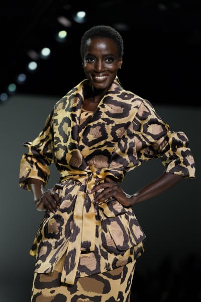 A model walks on the runway at the IA London fashion show during