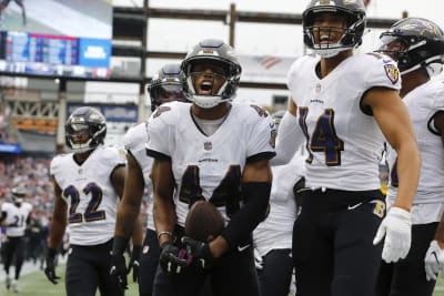 Jackson accounts for 5 TDs, Ravens hold off Patriots 37-26