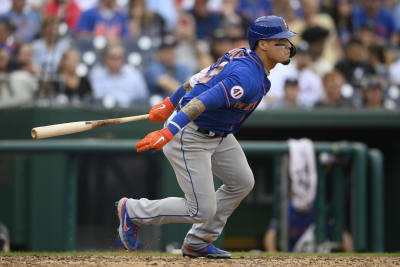 DETROIT, MI - MAY 03: Detroit Tigers shortstop Javier Baez (28) applies the  tag as New York Mets shortstop Francisco Lindor (12) tried to stretch a  single into a double during the