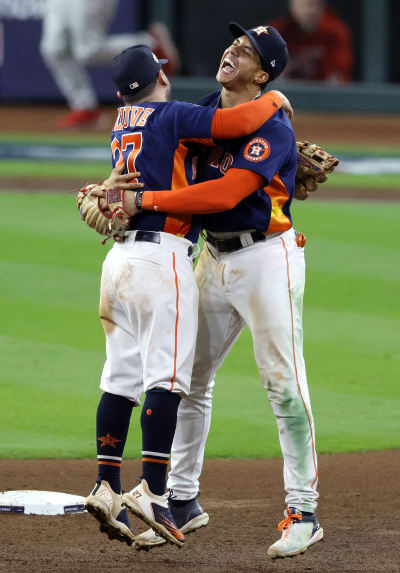 PURE JOY: See the smiles on the field as the Houston Astros celebrate  another World Championship