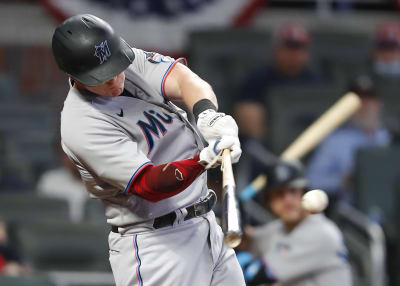 Garrett Cooper of the Miami Marlins in action against the Pittsburgh  News Photo - Getty Images