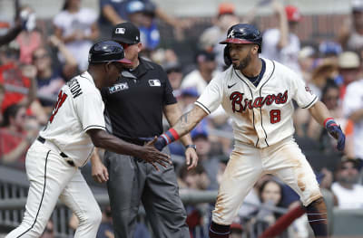 Atlanta Braves' Eddie Rosario runs the bases after hitting a home