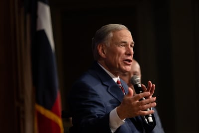 Texas Gov. Abbott poses for pictures with Astros World Series