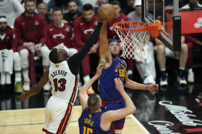 Reggie Jackson of the Denver Nuggets drives to the basket during