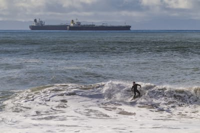 High surf advisories remain in some parts of California, as ocean  conditions begin to calm