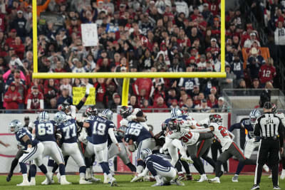 Cowboys render coin toss mix-up moot, throttle Rams 44-21