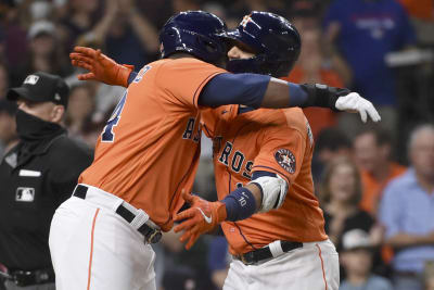 Yuli Gurriel of the Houston Astros celebrates after hitting a