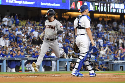 The Diamondbacks say their rule had nothing to do with that fan changing  out of his Dodgers gear - NBC Sports