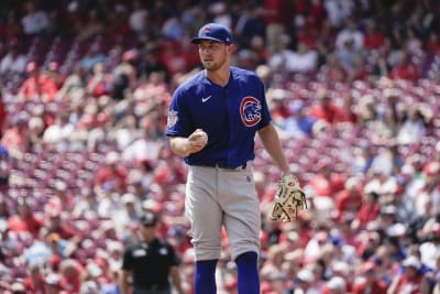 Depleted Cubs quiet playoff-contending Reds again, win 7-1