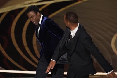 Will Smith appears to smack Chris Rock for joke about wife at Oscars