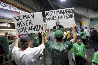 A's fan come en masse for a reverse boycott to tell owner Fisher