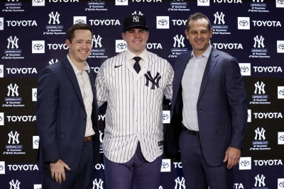 Carlos Rodón, newly shaved, puts on Yankees pinstripes