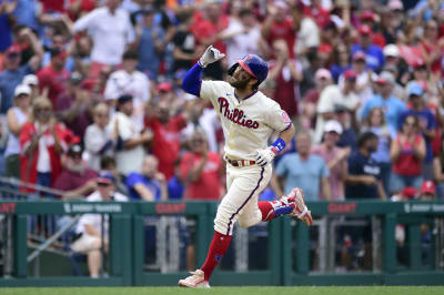 Harper hits 2 solo home runs, Nola pitches 5 innings as Phillies