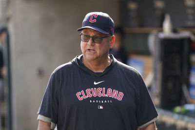 Boston Red Sox manager Terry Francona, left, grabs the shirt of