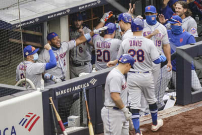 Estevan Florial of the New York Yankees celebrates in the dugout