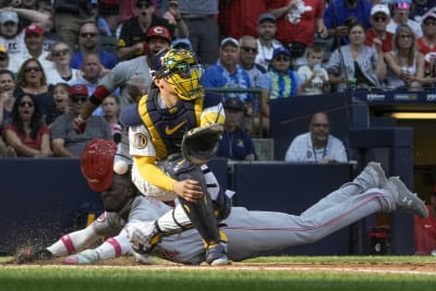 Cruz HR, drives in lead run, Pirates top Reds on opening day