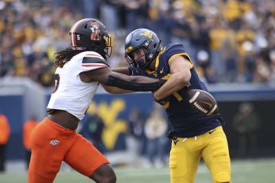 Gordon guides Oklahoma State to fifth straight win in Morgantown