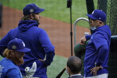 Los Angeles Dodgers' Dustin May takes liner off head during game