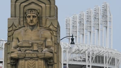 What's the story behind the iconic statues outside Progressive Field?