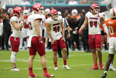 Louisville Football] Glow in the dark unis to spice up a Thursday game. :  r/CFB