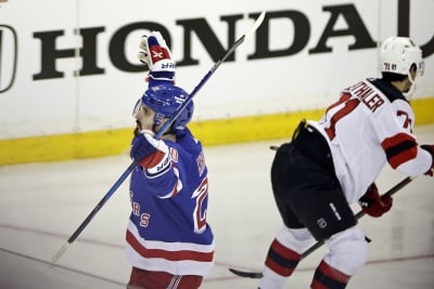 Jack Hughes of the New Jersey Devils reacts after scoring a goal