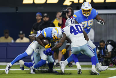 Turpin shines, Cowboys crush Chargers