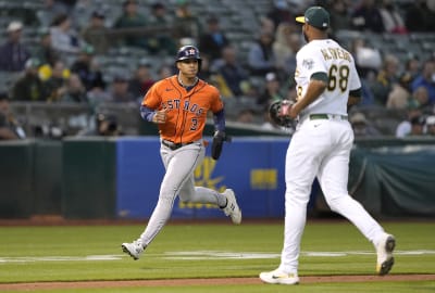 Tucker's slam highlights 6-run fifth inning, Astros beat A's