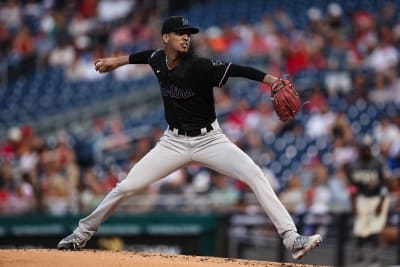 Miami Marlins' Jake Burger reacts as he rounds the bases on his home run  during the third inning of a baseball game against the Washington  Nationals, Saturday, Sept. 2, 2023, in Washington. (