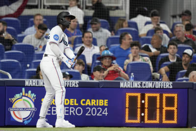 Puig returns with RBI double, Reds sweep Marlins 5-0