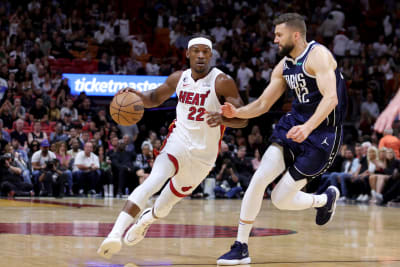 Butler leads Heat to late win against Pistons, 118-105