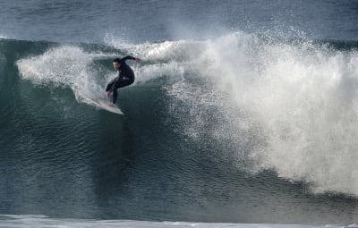 Huge surf pounds beaches on West Coast and in Hawaii with some low