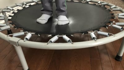 Jumping on a mini trampoline online