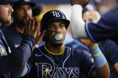 CHICAGO, IL - APRIL 30: Tampa Bay Rays left fielder Randy Arozarena (56)  looks on from the dugout during a Major League Baseball game between the  Tampa Bay Rays and the Chicago