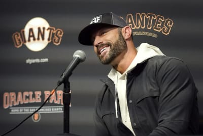 DETROIT, MI - AUGUST 24: San Francisco Giants manager Gabe Kapler (19)  walks back to the mound after a pitching change during the Detroit Tigers  versus the San Francisco Giants on Wednesday