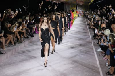 A model walks the runway at the Prada show during Milan Men's