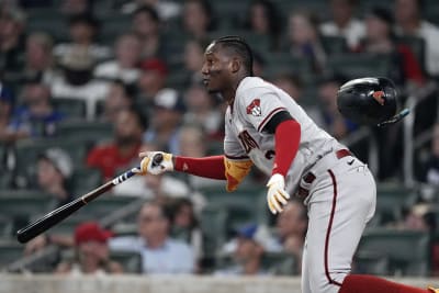 Juan Soto throws Ozzie Albies' batting gloves after the force out. :  r/baseball