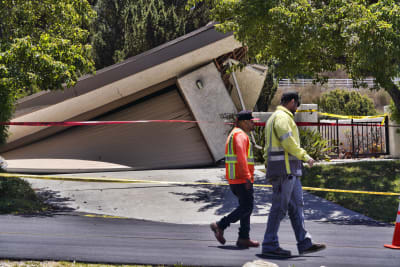 Destructive Southern California landslide slows but more homes ordered  evacuated as sewer breaks