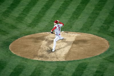 A's hit 3 HRs, Laureano's 3 fine catches help top Angels 8-4