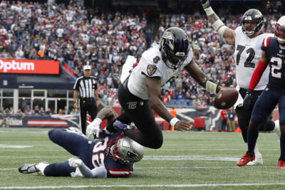 Torrid Ravens get jump on Giants, roll to easy 27-13 victory