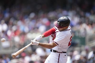 Dale Murphy of the Atlanta Braves follows through on his swing