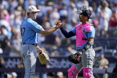 Tampa Bay Rays pitcher Jason Adam, left, and catcher Christian