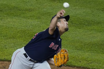 Boston Red Sox's Hirokazu Sawamura throws a pitch during the fifth