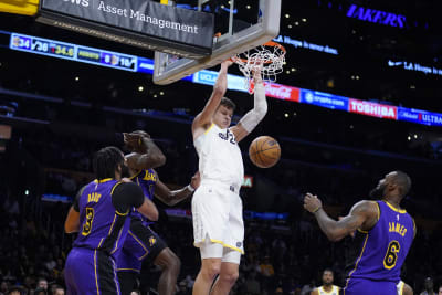 Lakers overcome Lonzo Ball's injury to beat Mavs in title game