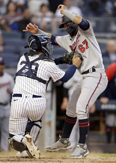 New York Yankees' Jose Trevino catches against the Minnesota Twins